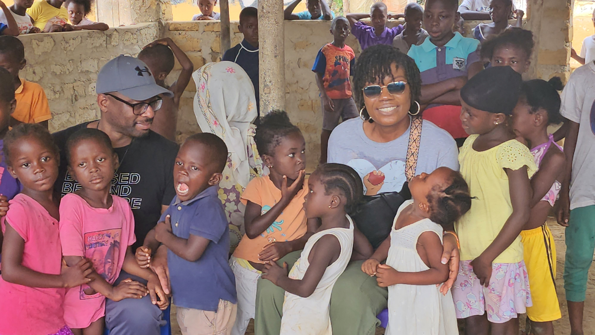 KRN founders with village children in Liberia