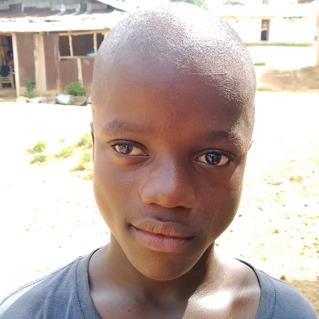Sando D., age 13, in Malema, Liberia