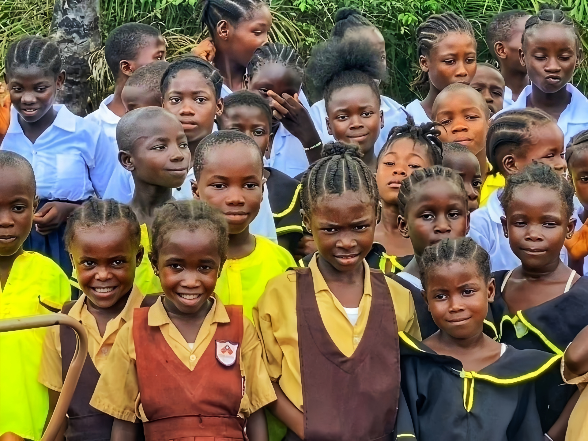 Liberian students in school uniforms sponsored through KRN's VCESP Education Sponsorship Program