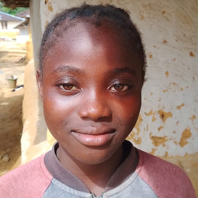 Famatta D., age 12, in Malema, Liberia